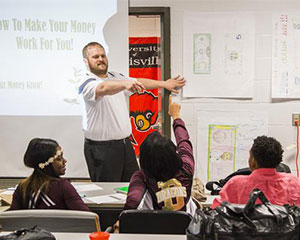 Teacher promotes financial literacy through program at Doss High School