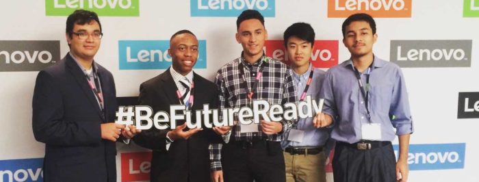 A group of students holding a sign that reads "Be Future Ready"