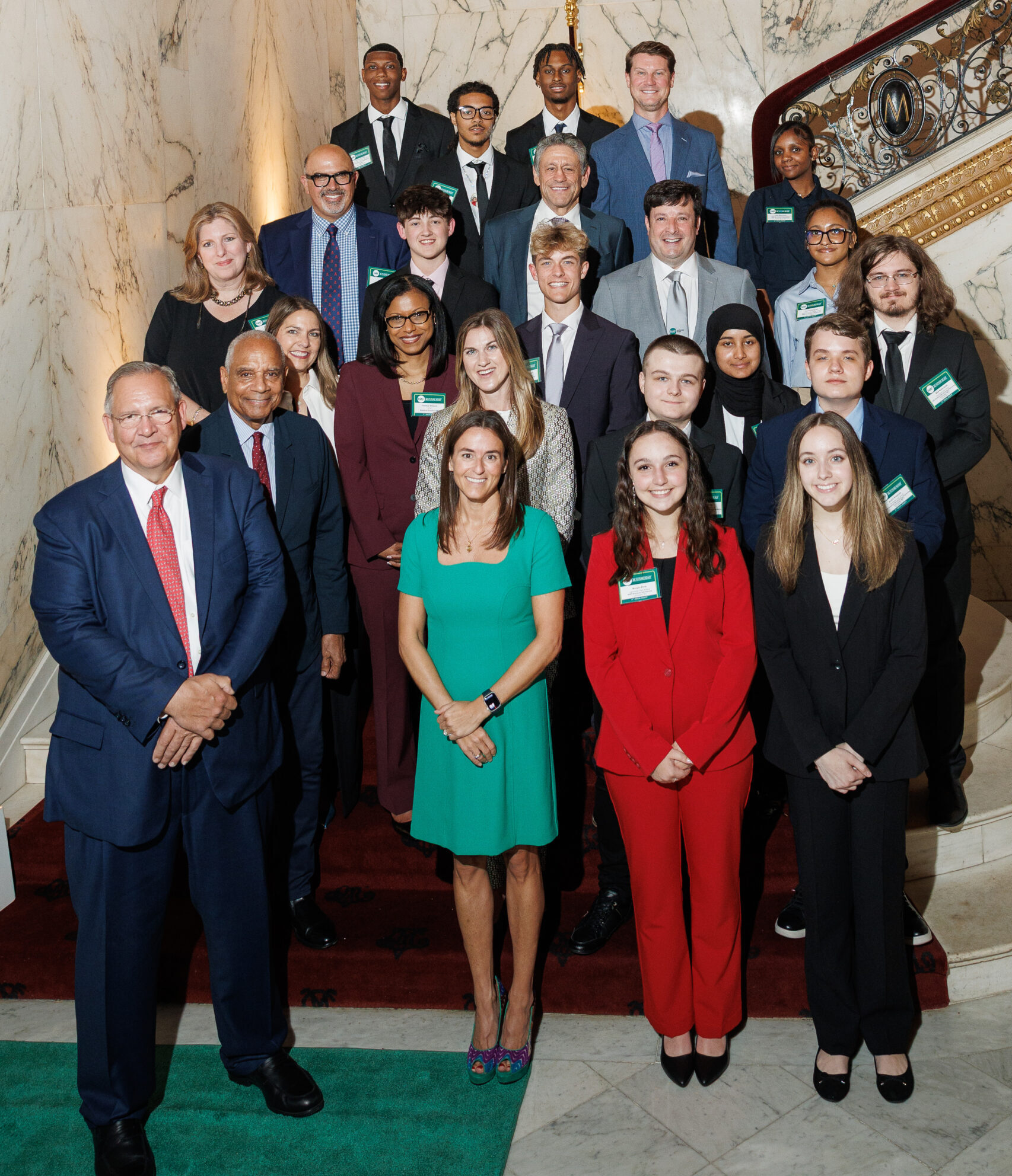 Group photo on the staircase at the NAF Benefit