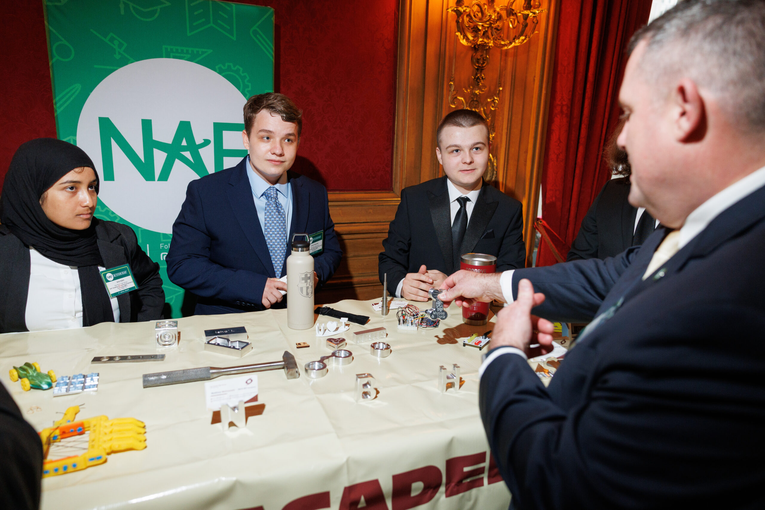 Students presenting at the NAF Benefit