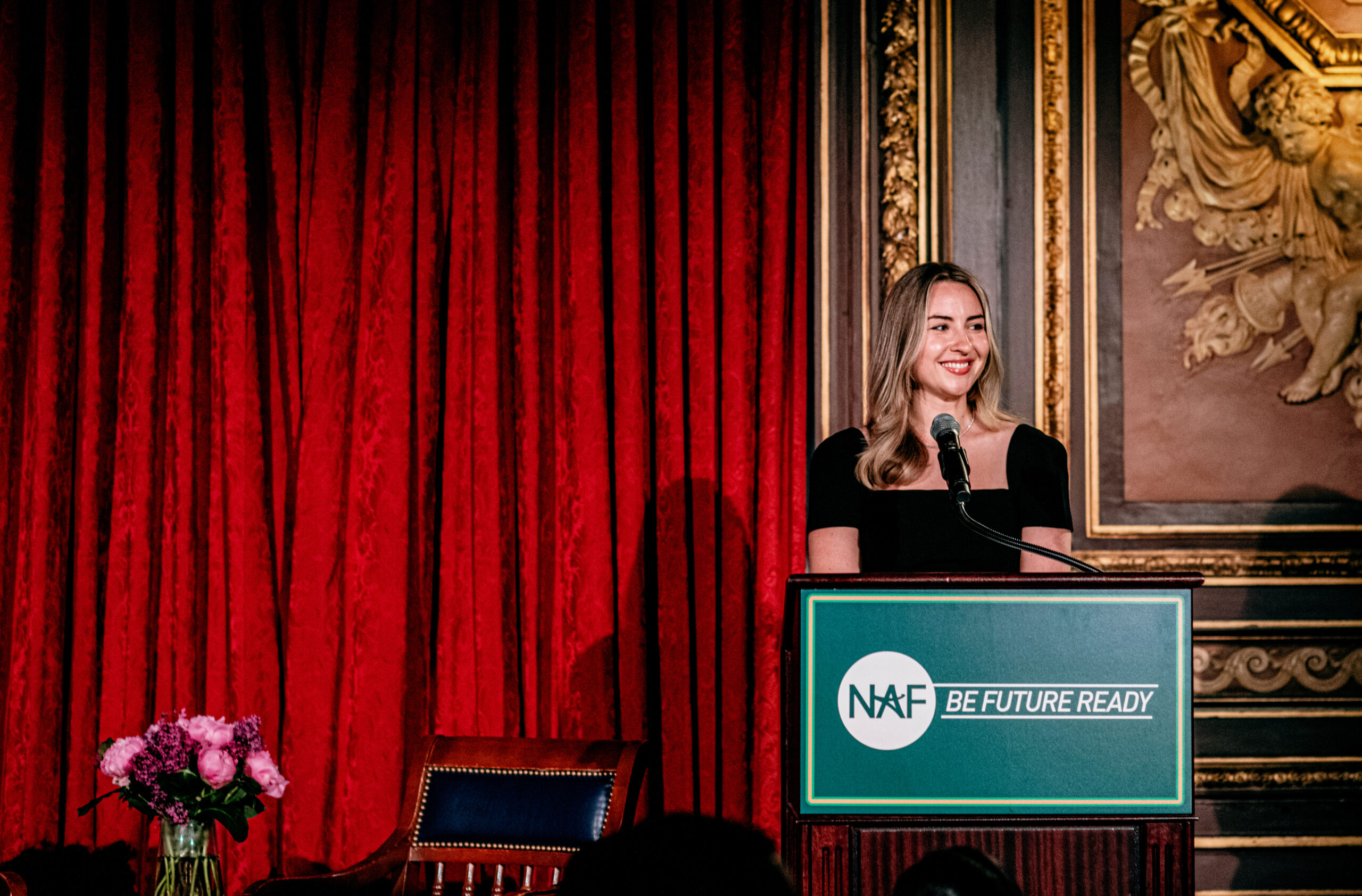 Lara, host and NAF Alum, speaking at the NAF Benefit