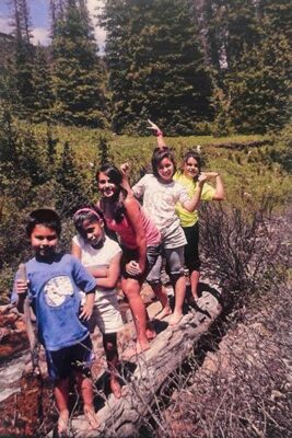 Family photo of Eduardo's camping trip in Poudre Canyon